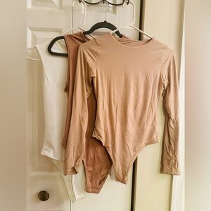 NWOT 3 bundle of neutral bodysuits. Size S.